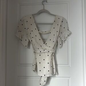 White top with navy polka dots, small